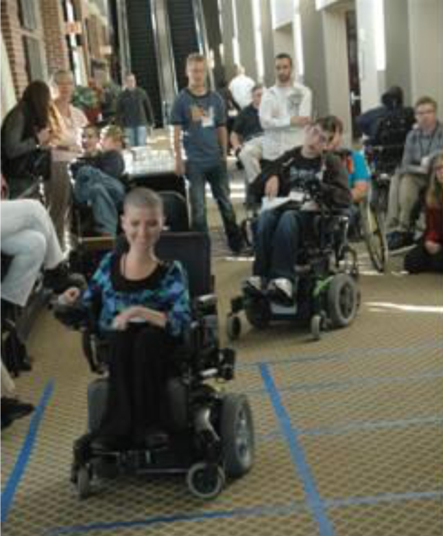 5-Lady-in-mobilty-chair-at-exhibits