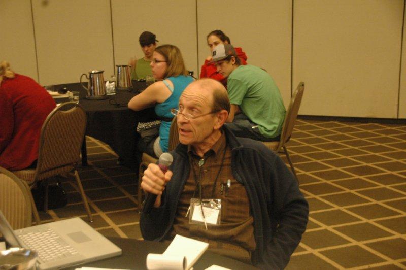 Man sharing a comment at a session