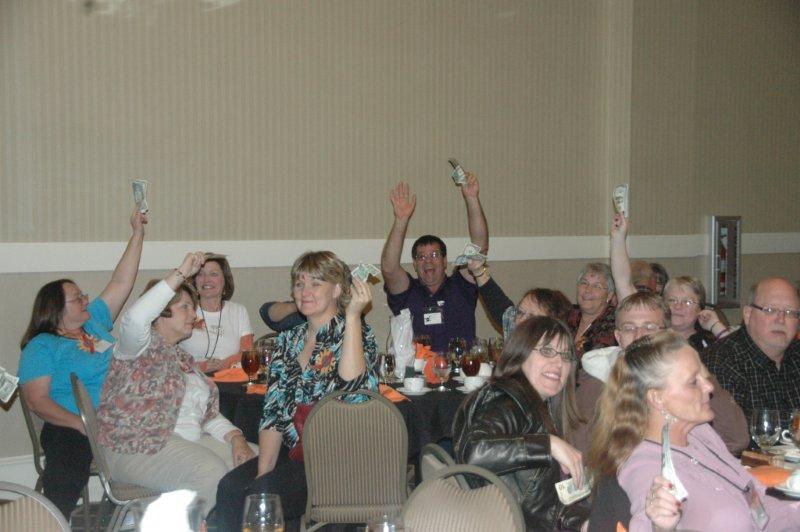 Hands up in a group discussion