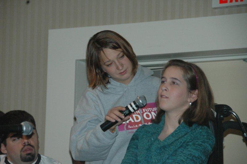 Youth sharing at the microphone