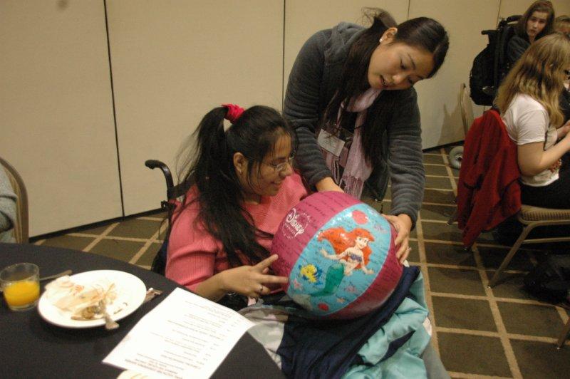 two people looking at a beachball