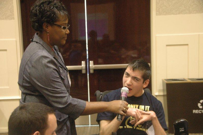 Evelyn gathers ideas from the audience