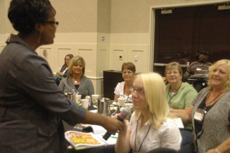 Lady has a thought to share with the group