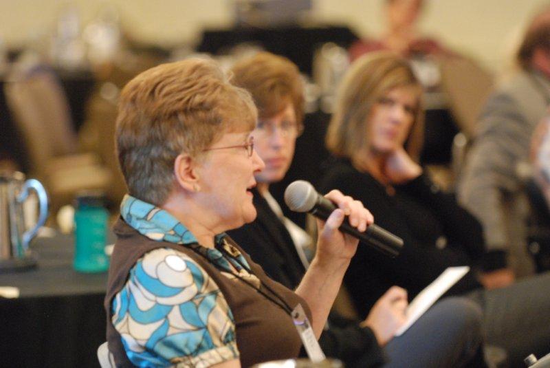 Profile of a lady with the microphone